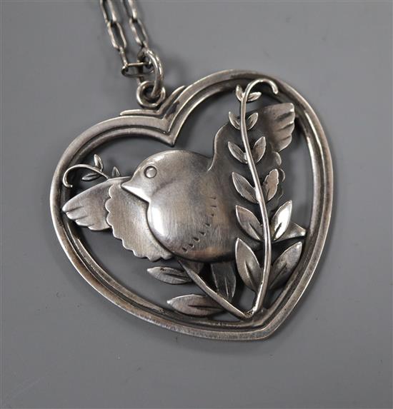 A Georg Jensen sterling robin and wheatsheaf heart shaped pendant, no. 97, with chain, pendant 40mm.